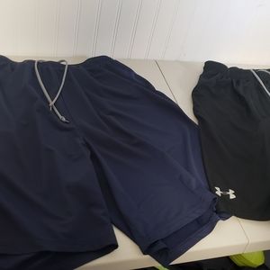 Two pairs UA shorts sz L